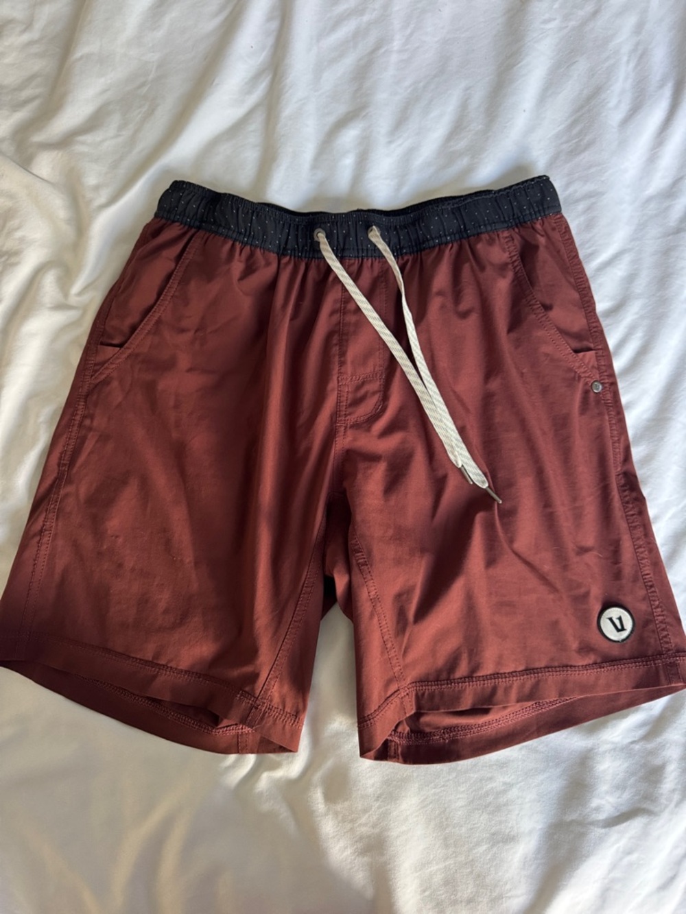 Vuori Men's Athletic Shorts in Rust with Black Waistband